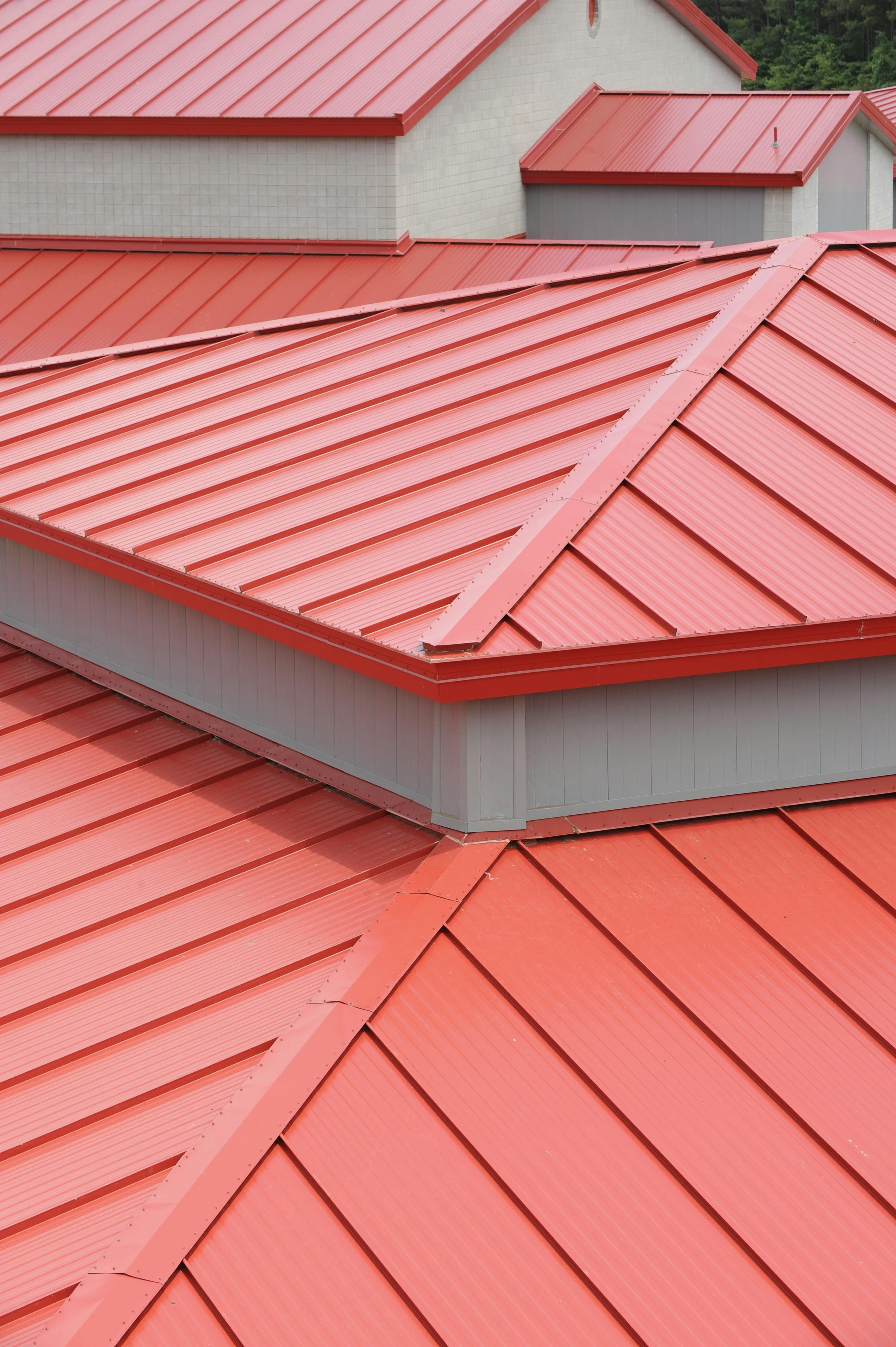 The Panels Were Finished In Cool Bright Red And Replaced A Standing Seam Metal Roof That Was Not Performing Properly