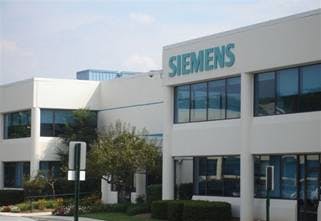 The building is 27% more energy efficient than similar buildings, uses 21% less water, and produces nearly 600 fewer metric ton