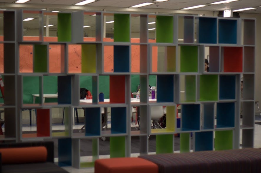 The City Year transformation took place within the short time frame of one week and included a custom designed bookcase, tile ca