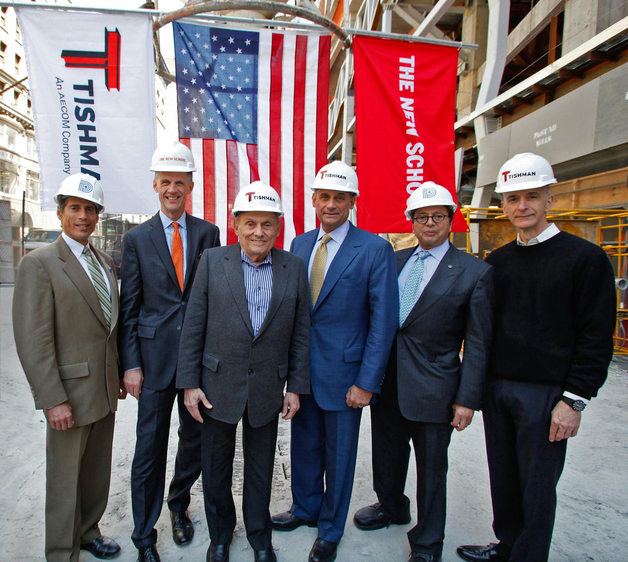 From left to right: Jody Durst, David Van Zandt, John Tishman, Daniel Tishman, Douglas Durst and Roger Duffy celebrate the 'topp
