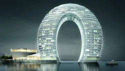 Located On Lake Tai, The Sheraton Huzhou Hot Spring Resort By Mad Is A 102 Meter Tall Hotel Whose Shape Evokes A Gigantic Ring Located On Lake Tai, The Sheraton Huzhou Hot Spring Resort By Mad Is A 102 Meter Tall Hotel Whose Shape Evokes A Gigantic Ring