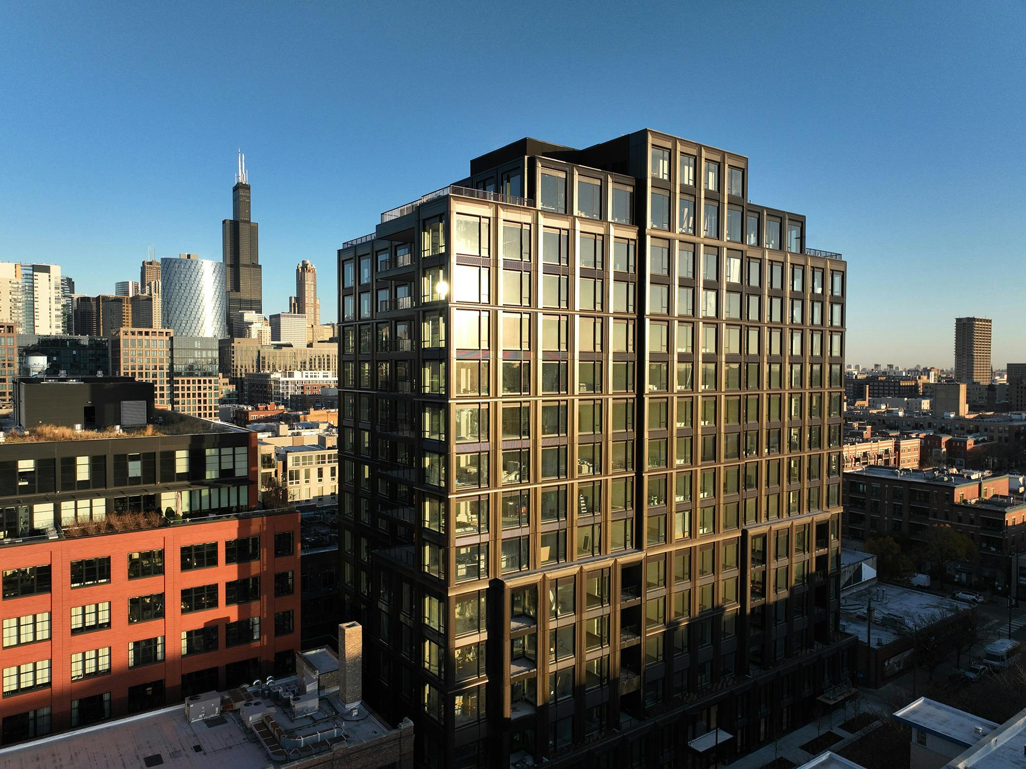 Rising 16 stories above Chicago&rsquo;s West Loop neighborhood, Embry features a richly detailed dark bronze-colored aluminum exterior that changes hues as the sun moves across the sky