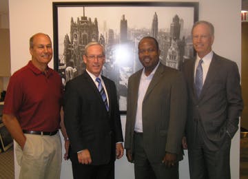 From left to right: Treasurer Ken Egidi, Pepper Construction Company; Builders Association Executive Director Dan McLaughlin; Chairman Jimmy Akintonde, Ujamaa Construction; Vice Chairman Jeff Raday, McShane Construction Company