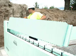 Worker carrying Duramax ICF Worker carrying Duramax ICF