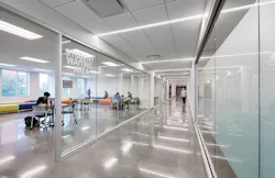 Houston Community College Coleman College Student waiting area with students sitting at desks Houston Community College Coleman College Student waiting area with students sitting at desks