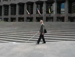 Architect Chris Downey navigates a sidewalk in San Francisco Architect Chris Downey navigates a sidewalk in San Francisco