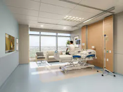 Modern hospital room with man on bed Modern hospital room with man on bed