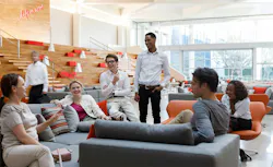 Office workers chatting Office workers chatting