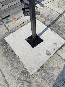 Finished Ultra Aluminum Railing Post On Rooftop Terrace Shows Post Flush With Walking Surface And Sealed Against Water Infiltration Finished Ultra Aluminum Railing Post On Rooftop Terrace Shows Post Flush With Walking Surface And Sealed Against Water Infiltration