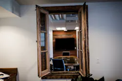 Window made from reclaimed barn wood in the Mortenson Construction Office Window made from reclaimed barn wood in the Mortenson Construction Office