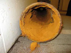 Figure 3 – Iron Ochre Buildup in Sub-Grade Drainage System Pipe Figure 3 – Iron Ochre Buildup in Sub-Grade Drainage System Pipe