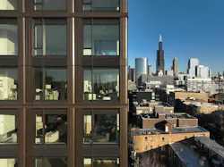 large window openings offer framed views of the surrounding cityscape large window openings offer framed views of the surrounding cityscape