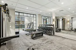 Fitness room in luxury condo building Fitness room in luxury condo building