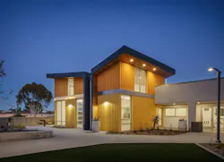 Puesta del Sol Apartments, San Diego exterior at night of affordable housing project Puesta del Sol Apartments, San Diego exterior at night of affordable housing project