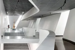 Second-level interior view overlooking the grand stair and landing gallery. Photo: ©Mauricio Rojas, Courtesy of UT Dallas Second-level interior view overlooking the grand stair and landing gallery. Photo: ©Mauricio Rojas, Courtesy of UT Dallas