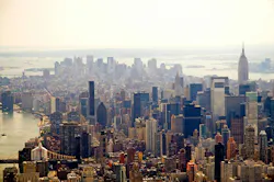 An aerial view of the Manhattan skyline and the Empire State Building in New York City. An aerial view of the Manhattan skyline and the Empire State Building in New York City.