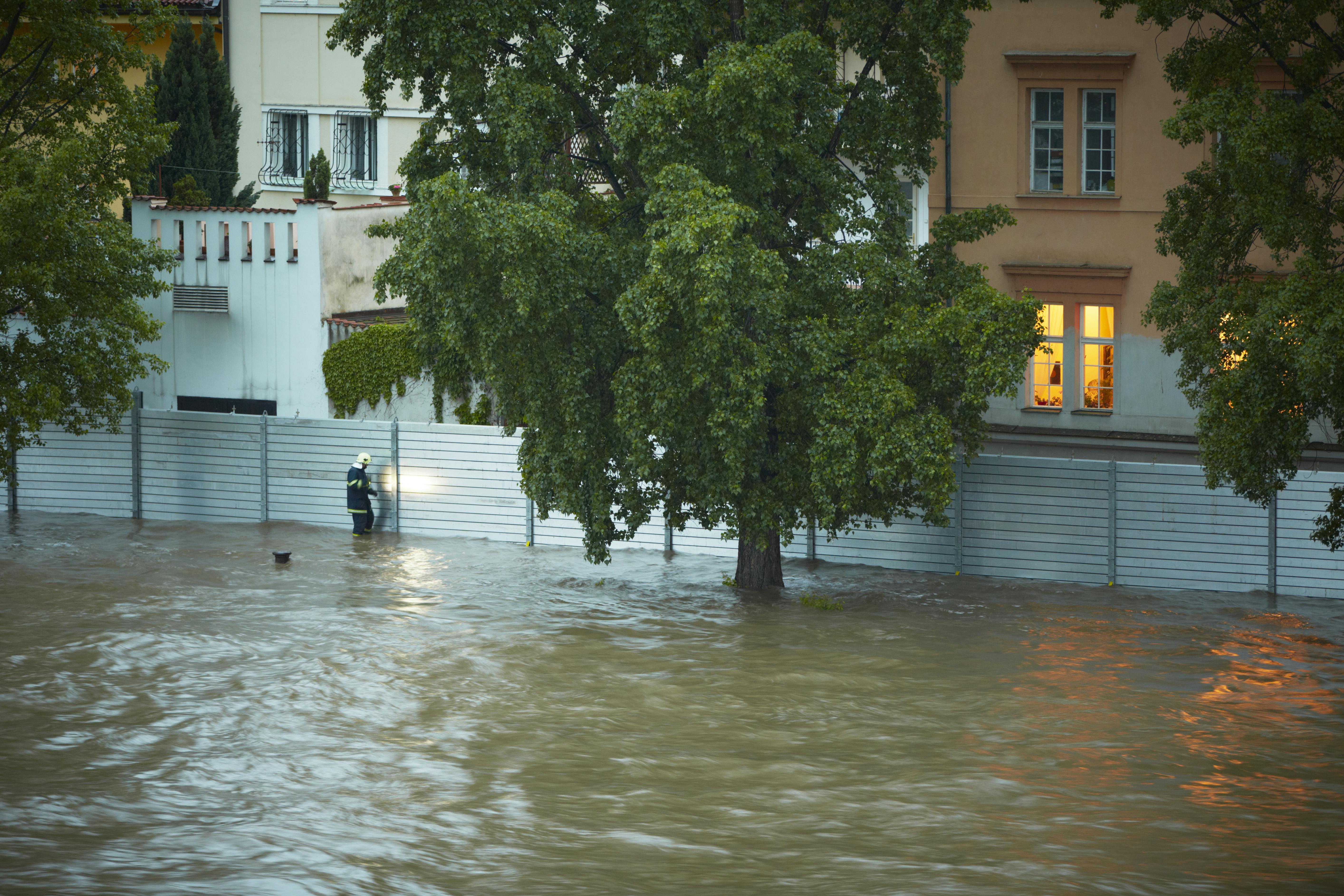 Fire brigade have been putting up metal flood barriers. Flood in Prague, Czech Republic.