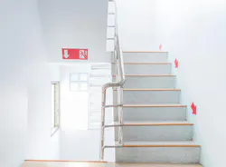 Stairwell fire escape in a modern building. Stairwell fire escape in a modern building.