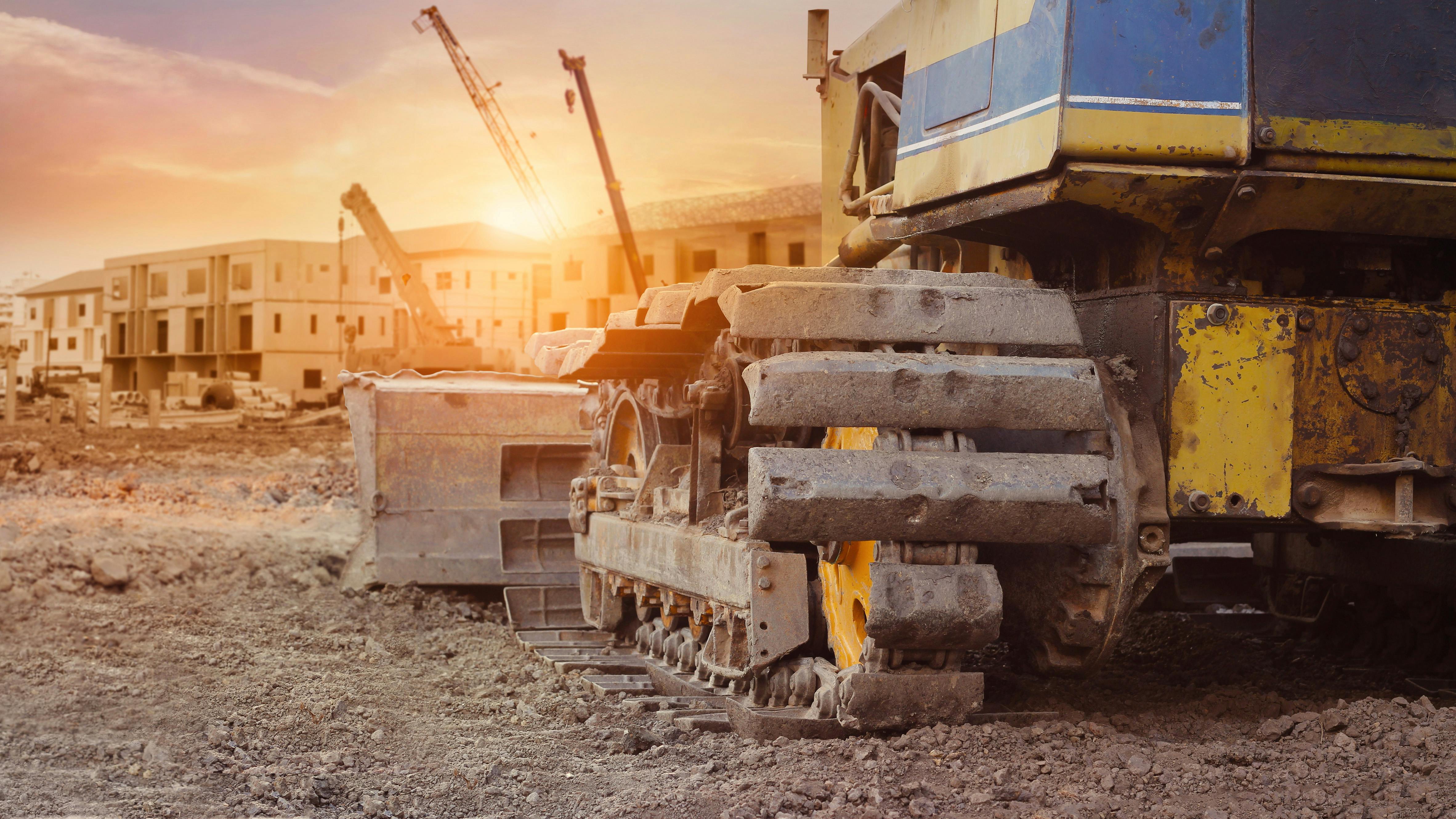 Construction equipment in construction new building background, excavator with crane on construction site, industrial of realestate
