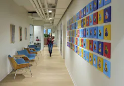 The central connecting hallway features the firm’s “We Wall,” where each employee customizes a cultural classic—the rubber duck—as a unique expression of individuality displayed alongside their colleagues, celebrating the spirit of One Team The central connecting hallway features the firm’s “We Wall,” where each employee customizes a cultural classic—the rubber duck—as a unique expression of individuality displayed alongside their colleagues, celebrating the spirit of One Team