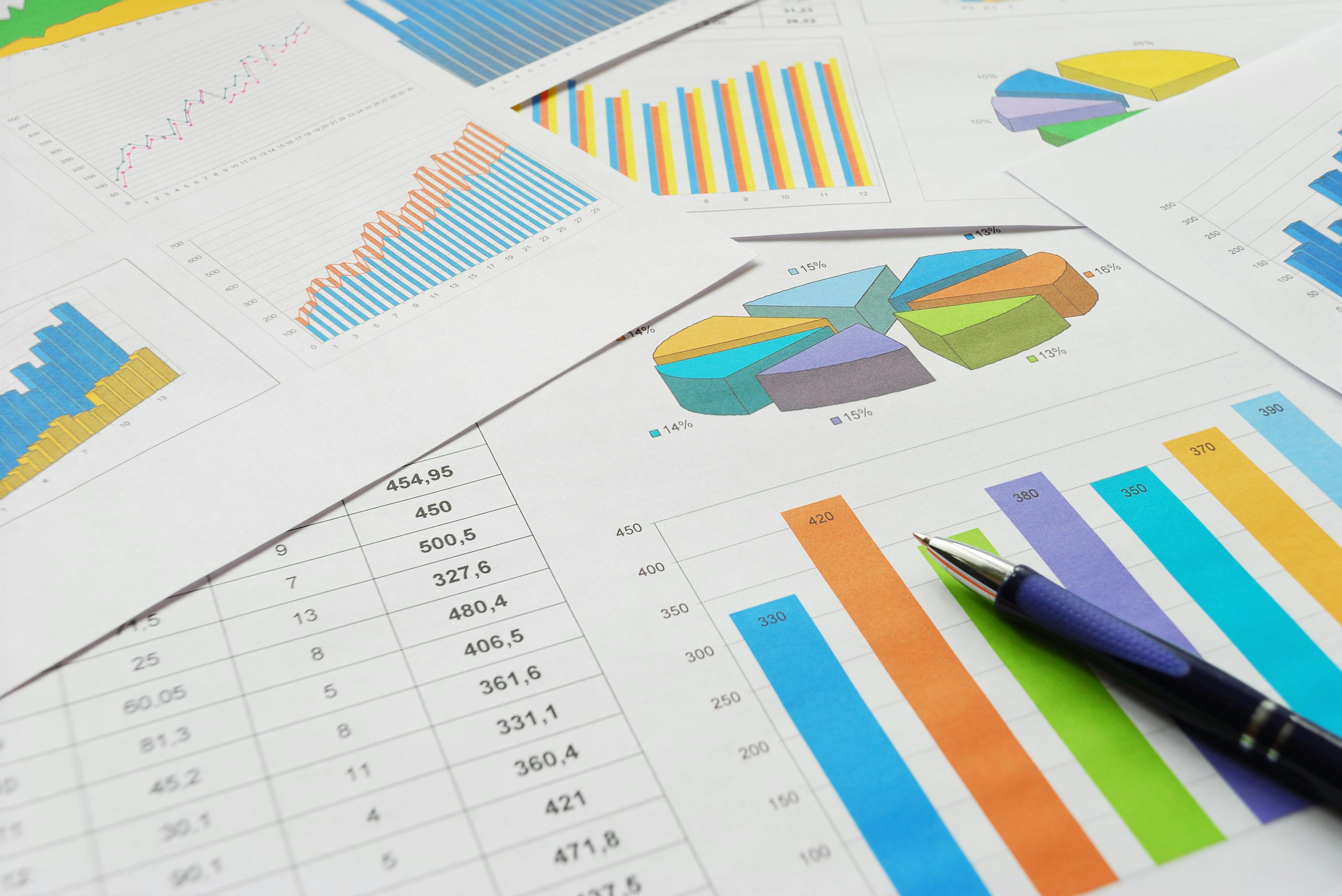 Top view of the pen on finance documents.