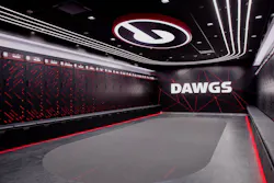 The track and field locker room at the University of Georgia was converted from a football locker room and outfitted with technology and the team’s red and black colors The track and field locker room at the University of Georgia was converted from a football locker room and outfitted with technology and the team’s red and black colors