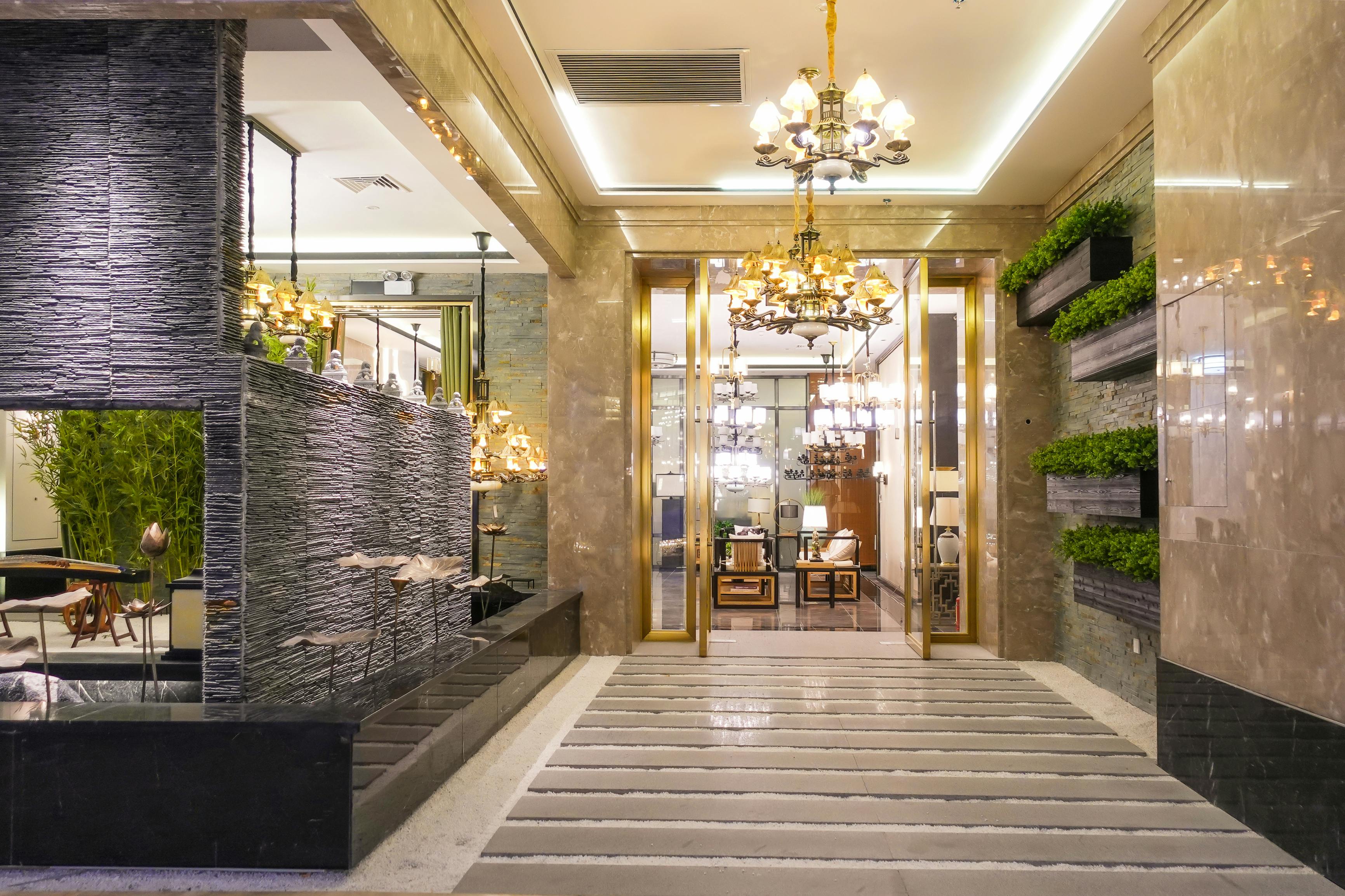 Luxury hotel lobby corridor hotel passageway. Luxury hotel lobby lit by pendant lighting