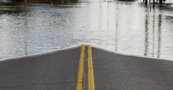 Road Closure From Flooding. Road closed due to river flooding in neighborhood. Road Closure From Flooding. Road closed due to river flooding in neighborhood.