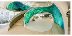 Hana Bank's trading floor features curved lines and natural materials to evoke a sense of calm Hana Bank's trading floor features curved lines and natural materials to evoke a sense of calm