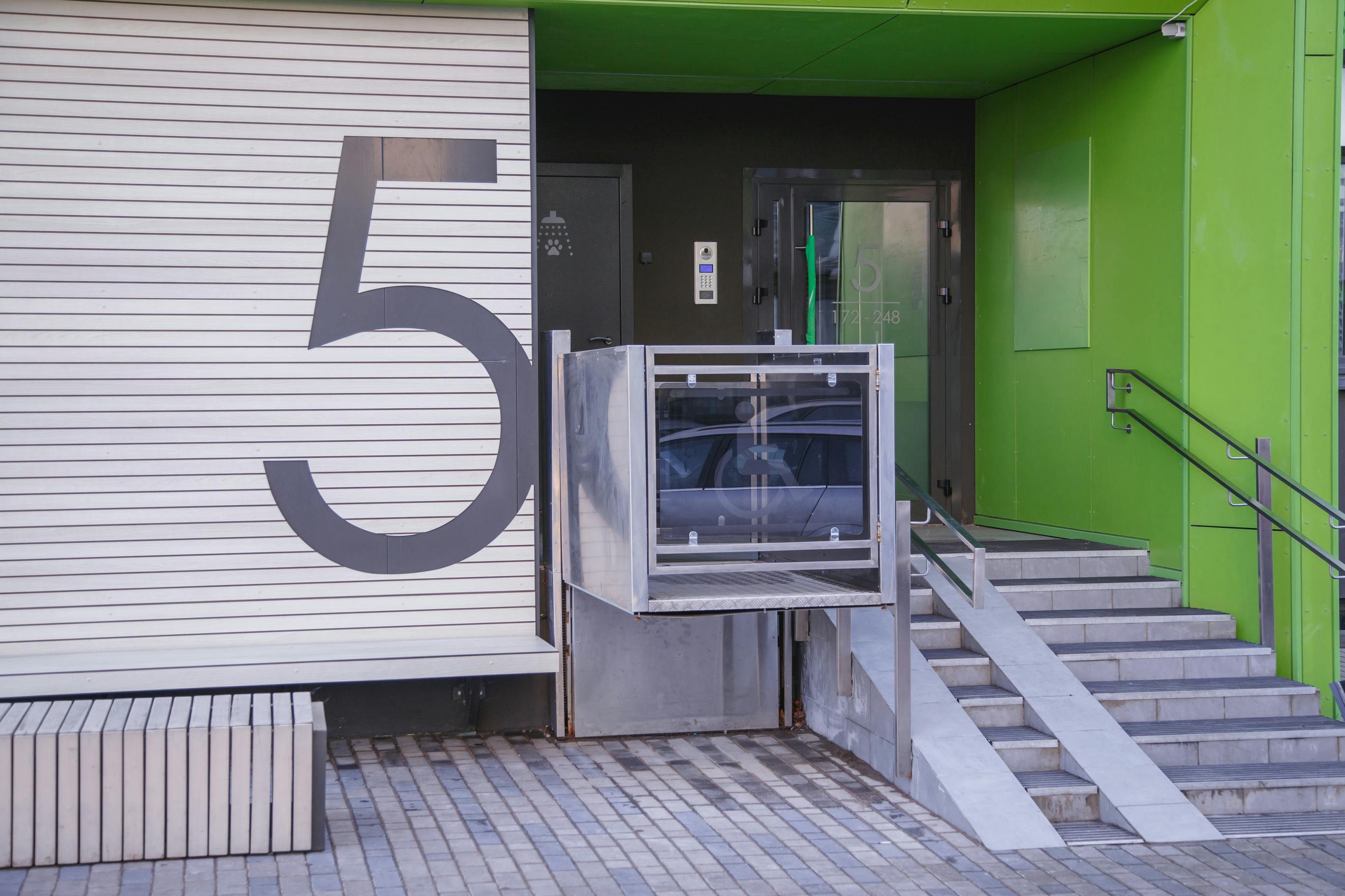 The special elevator for the disabled at the entrance to the living house.