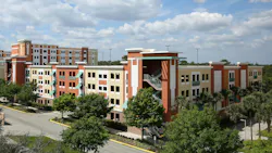 Student housing at the University of Central Florida. ORLANDO, FLORIDA, USA - MARCH 15, 2019: Aerial view of the University of Central Florida`s Towers at Knight Plaza housing and residence buildings. Student housing at the University of Central Florida. ORLANDO, FLORIDA, USA - MARCH 15, 2019: Aerial view of the University of Central Florida`s Towers at Knight Plaza housing and residence buildings.