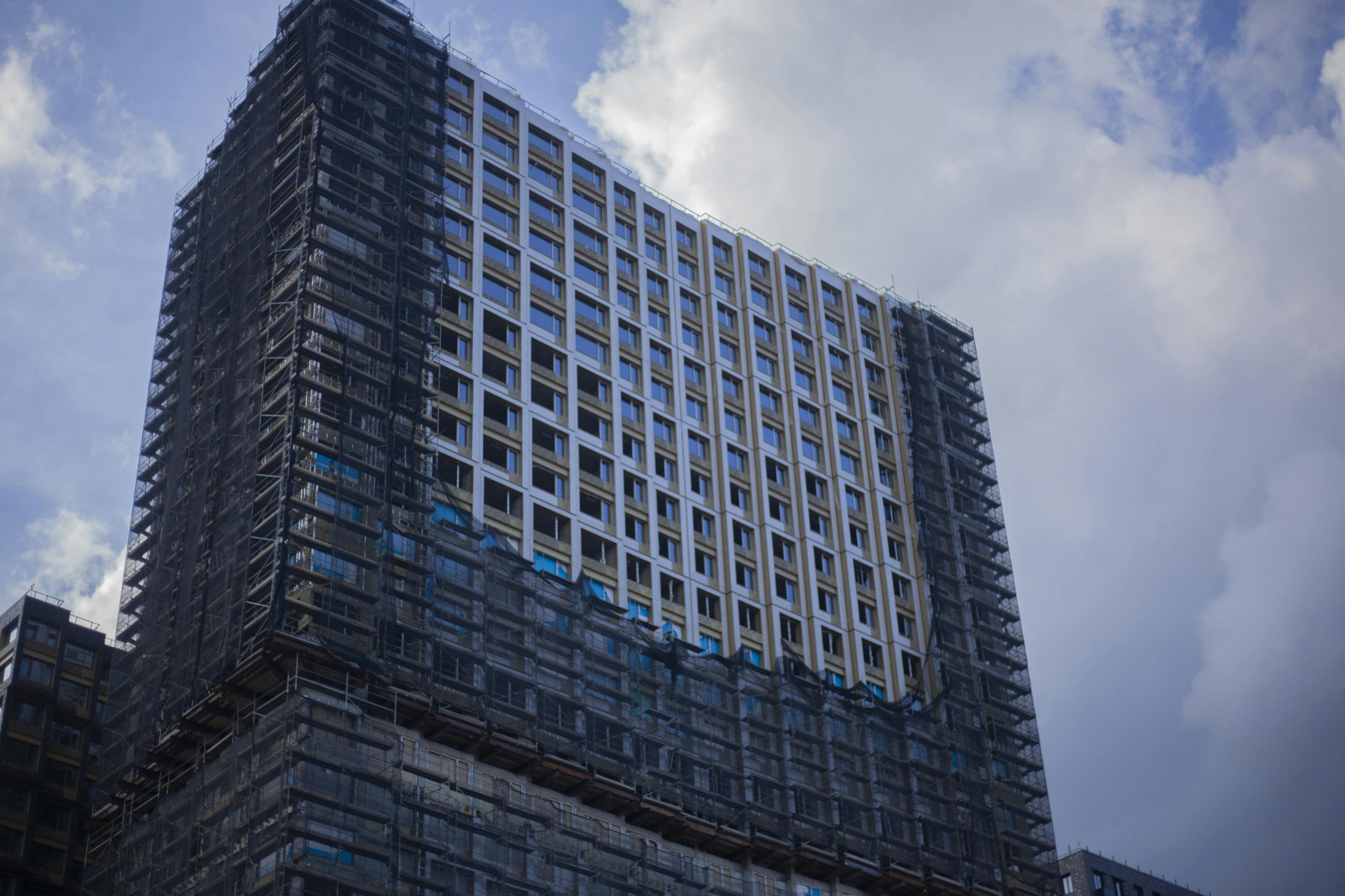 The construction of a high-rise building. Business center in the city. Urban planning for the construction of new buildings. Architecture in modern times. Office house