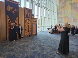 Jenny Blanchart, director of property management for The Muller Company, snaps a photo of Suzi Mier, senior property manager for the Muller Company; Jeff Buchanan, director of facilities for the Canyon Park Tech Center in Orem, Utah, a nominee in the Suburban Office Park Low-Rise category; and Barri Heyman, senior property manager for the Muller Company. Mier’s building, Airport Tower in Irvine, California, won the TOBY Award for 100,000-249,999 Square Feet later that night. Jenny Blanchart, director of property management for The Muller Company, snaps a photo of Suzi Mier, senior property manager for the Muller Company; Jeff Buchanan, director of facilities for the Canyon Park Tech Center in Orem, Utah, a nominee in the Suburban Office Park Low-Rise category; and Barri Heyman, senior property manager for the Muller Company. Mier’s building, Airport Tower in Irvine, California, won the TOBY Award for 100,000-249,999 Square Feet later that night.