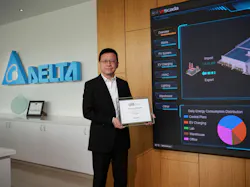 Kelvin Huang, president of Delta Electronics (Americas), displays a plaque designating the company's headquarters as achieving LEED Zero Energy certification from the USGBC. Kelvin Huang, president of Delta Electronics (Americas), displays a plaque designating the company's headquarters as achieving LEED Zero Energy certification from the USGBC.