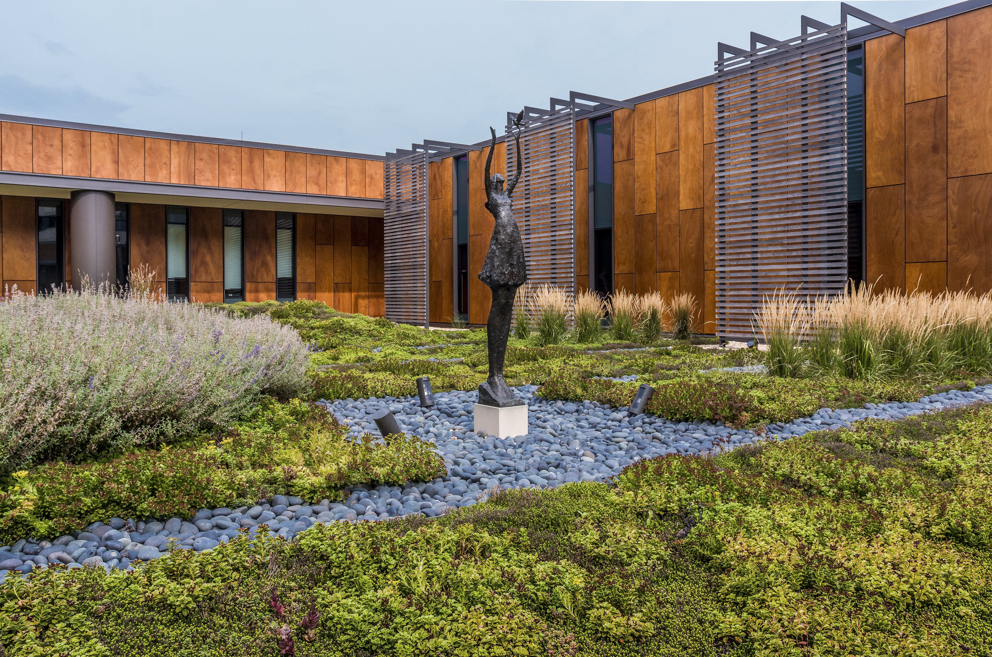 At Owensboro Hospital in Owensboro, Kentucky, elements of HGA&rsquo;s human-centered design include internal courtyards, comfortable lounge seating and etched-glass screens.
