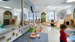 A multi-level fort at the far end of the classroom creates a destination for toddlers to discover as they make their way through the room. A multi-level fort at the far end of the classroom creates a destination for toddlers to discover as they make their way through the room.