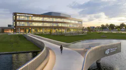 The shape of the Promise Bridge, zinc paneling and curved facade of Woolsey Hall are nods to Wichita’s influence on the aviation sector. The shape of the Promise Bridge, zinc paneling and curved facade of Woolsey Hall are nods to Wichita’s influence on the aviation sector.