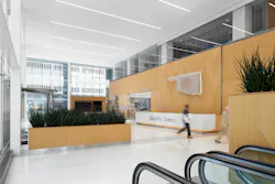 Removing the heavy concrete cornice detailing allowed the lobby to feel open and engaged with the street level and the urban fabric, letting daylight indoors and enabling pedestrians outdoors to see inside. Removing the heavy concrete cornice detailing allowed the lobby to feel open and engaged with the street level and the urban fabric, letting daylight indoors and enabling pedestrians outdoors to see inside.