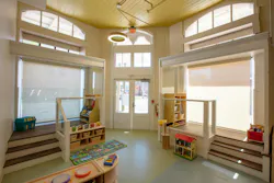 The original storefront windows for the Lemann Building have been transformed into play areas for the West Ascension Early Learning Center. The original storefront windows for the Lemann Building have been transformed into play areas for the West Ascension Early Learning Center.