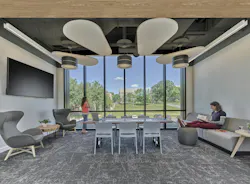 The top floor of Fahy Commons features a student lounge with custom-fabricated furniture created from site-salvaged wood. The lounge overlooks Muhlenberg College’s main campus. The top floor of Fahy Commons features a student lounge with custom-fabricated furniture created from site-salvaged wood. The lounge overlooks Muhlenberg College’s main campus.