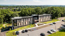From the moment visitors, staff, faculty, or students step into the Fahy Commons for Public Engagement and Innovation, they know they’re somewhere different. “When you walk up to the front door, you hear birds and bugs” in the native meadow, said Drew Lavine, partner and director of design for Re:Vision Architecture. “Before you walk inside, it signals that this is a different place. This is unlike anywhere else on campus.” From the moment visitors, staff, faculty, or students step into the Fahy Commons for Public Engagement and Innovation, they know they’re somewhere different. “When you walk up to the front door, you hear birds and bugs” in the native meadow, said Drew Lavine, partner and director of design for Re:Vision Architecture. “Before you walk inside, it signals that this is a different place. This is unlike anywhere else on campus.”