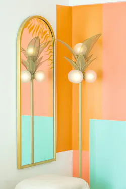 Floor lamps in the guestrooms channel palm trees. Floor lamps in the guestrooms channel palm trees.