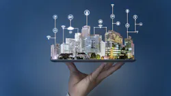 Image of human hand holding tablet with smart city projecting out of it. Image of human hand holding tablet with smart city projecting out of it.