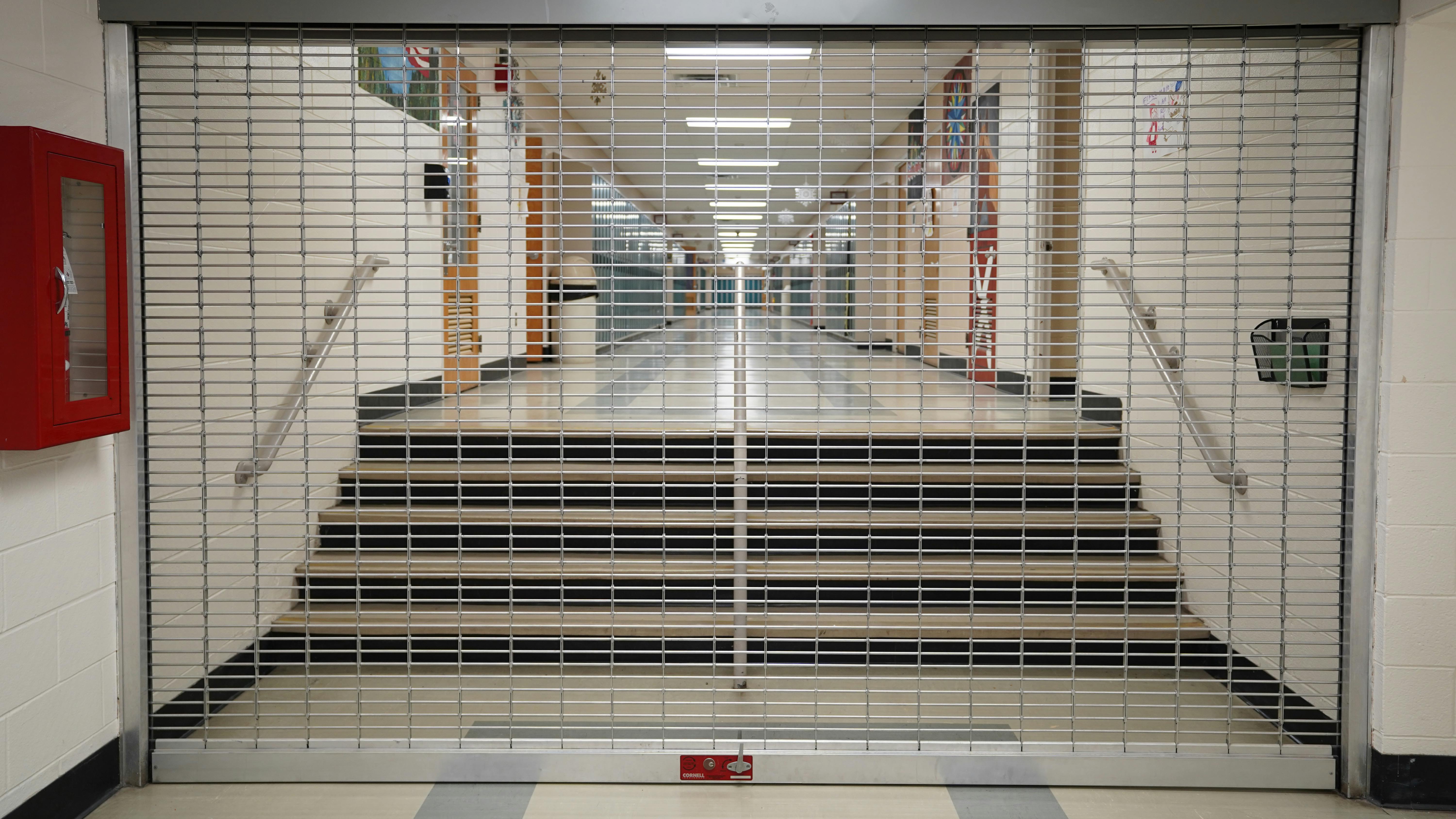 Roll-up security grilles can play many roles in a school.