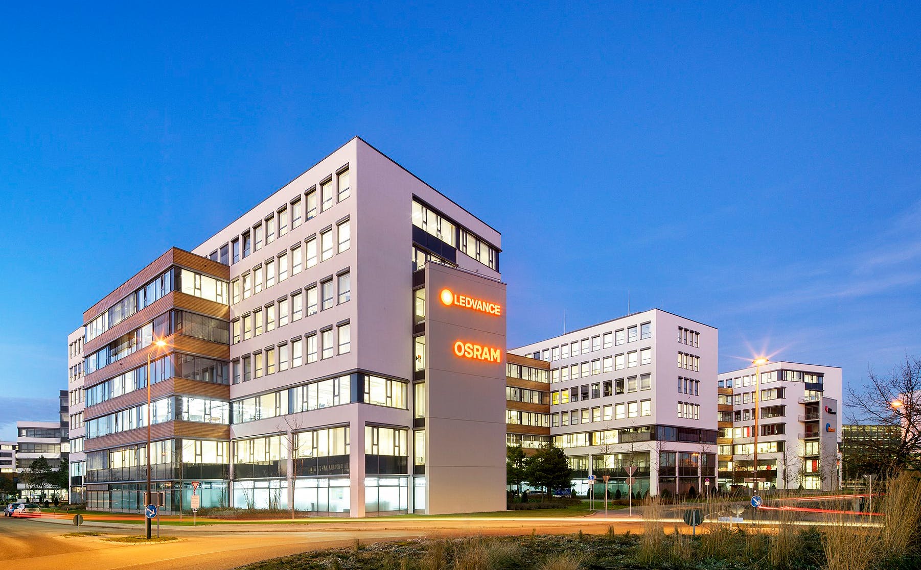 Newly Austrian-owned Osram and Chinese owned-LEDvance have had a certain shared quality about them since Osram sold LEDvance in 2017, as evidenced here at LEDvance headquarters in Garching, Germany. LEDvance has been featuring this image on its corporate press web page. But relations between the two have soured. (Image credit: Image by user LHL1 via Wikimedia Commons; used under CC BY-SA 4.0 - http://bit.ly/2JNKKXS.)