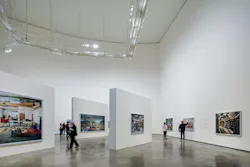 A single LED luminaire style provides projector, spotlight, and wall-wash effects in the Guggenheim Museum Bilbao, where Zumtobel considered and handled challenges such as tight beam distributions, high ceilings, and art preservation with its custom SSL fixture. (Photo credit: Image by Faruk Pinjo, courtesy of Zumtobel.) A single LED luminaire style provides projector, spotlight, and wall-wash effects in the Guggenheim Museum Bilbao, where Zumtobel considered and handled challenges such as tight beam distributions, high ceilings, and art preservation with its custom SSL fixture. (Photo credit: Image by Faruk Pinjo, courtesy of Zumtobel.)