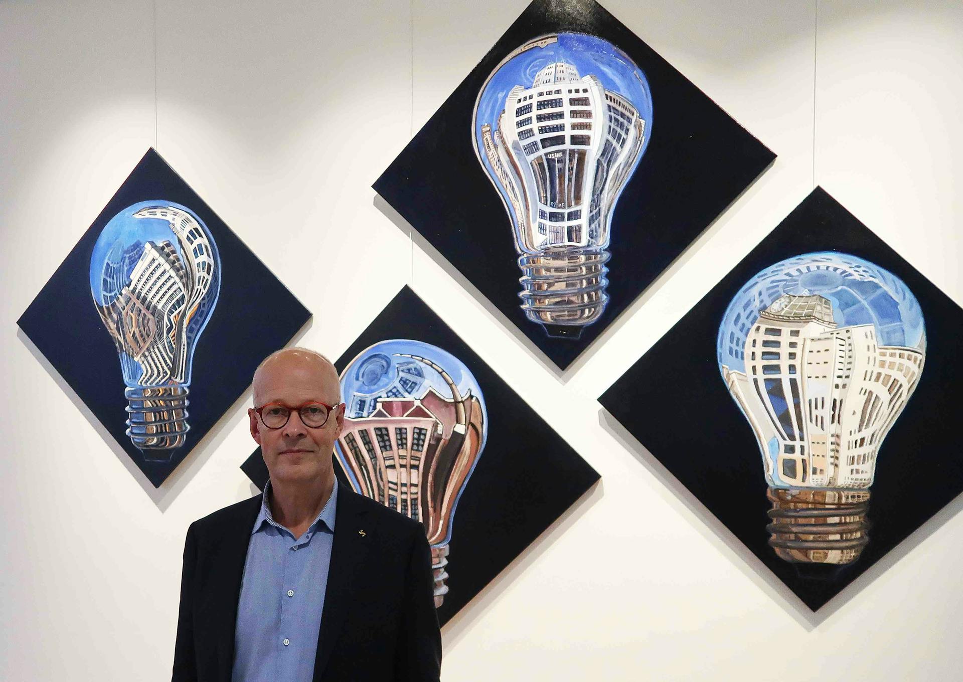 Good Light Group chairman Jan Denneman is a man on a nutritional light mission. He lives, breathes and even paints light, such as his reflecting bulb artwork hanging at Signify headquarters in Eindhoven. (Photo credit: Image courtesy of Jan Denneman.)
