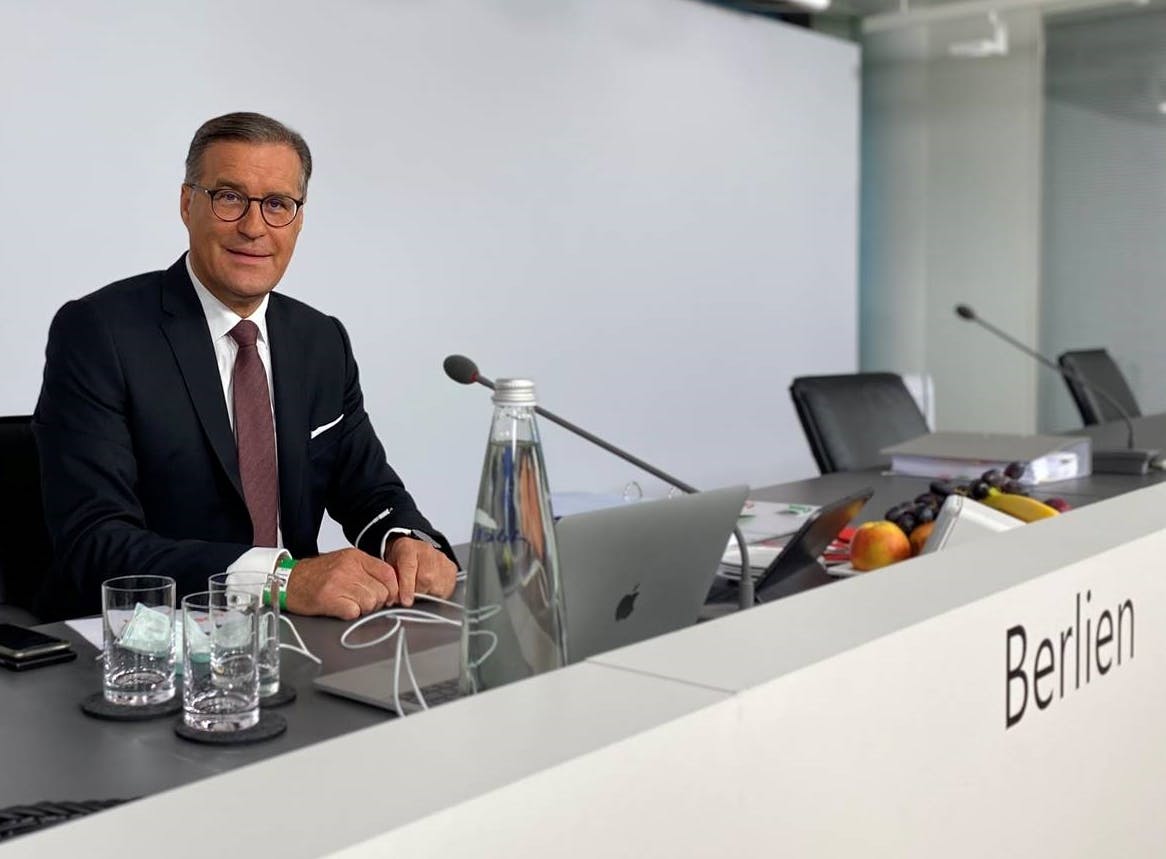 Outgoing Osram CEO Olaf Berlien sits at the top table here at the company's shareholders' meeting earlier this month, where voters approved the ams 'domination' status that is now leading to his ouster. At the time, Berlien said that the domination 'will enable Osram and ams together to forge the European global market leader in optical solutions.' (Photo credit: Image courtesy of Osram.)