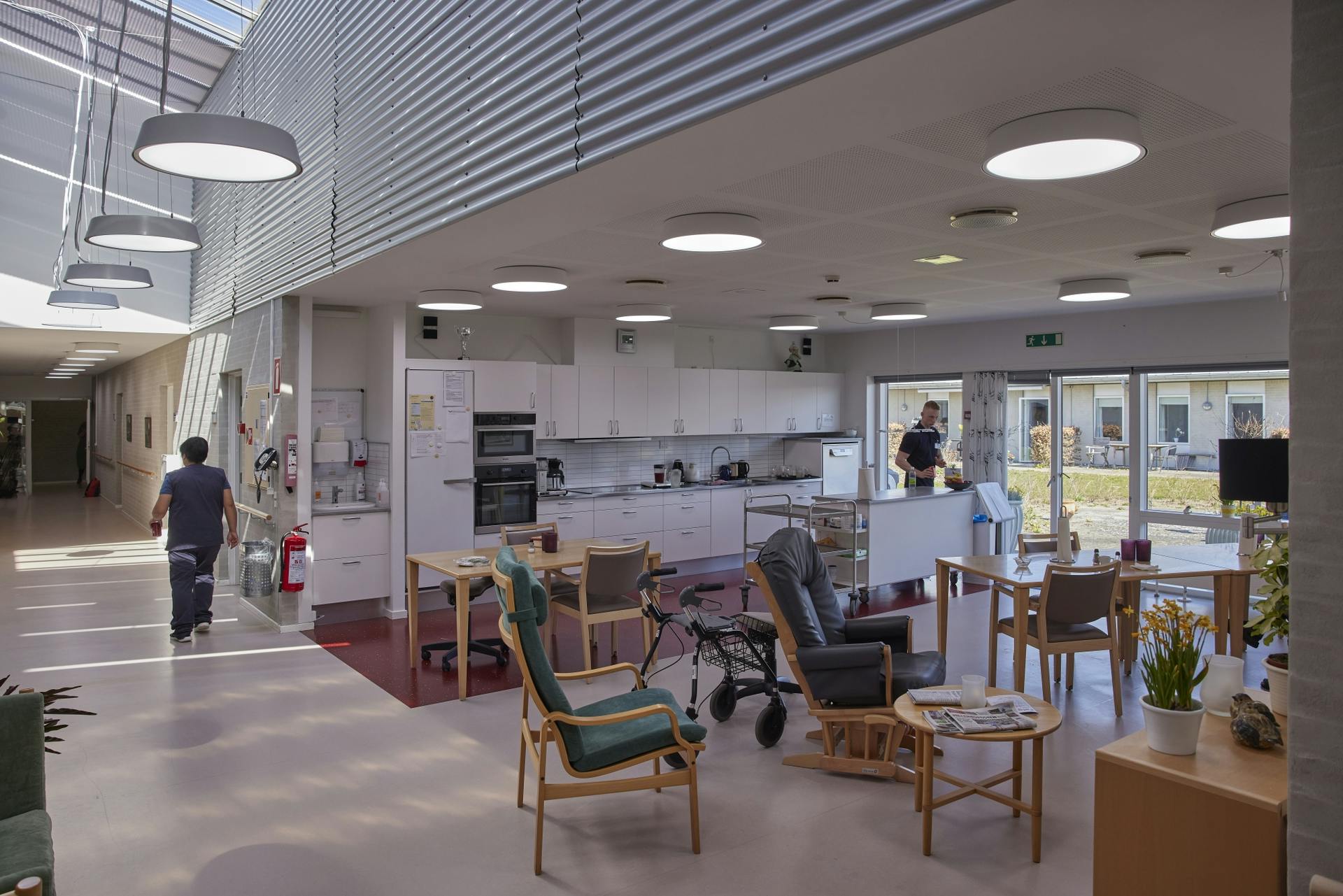 Care staff such as those pictured here in a common area of Bauneparken nursing home provided input on Chromaviso's circadian lighting user interface design, so the company is hoping they will be comfortable - and compliant - in using the system.