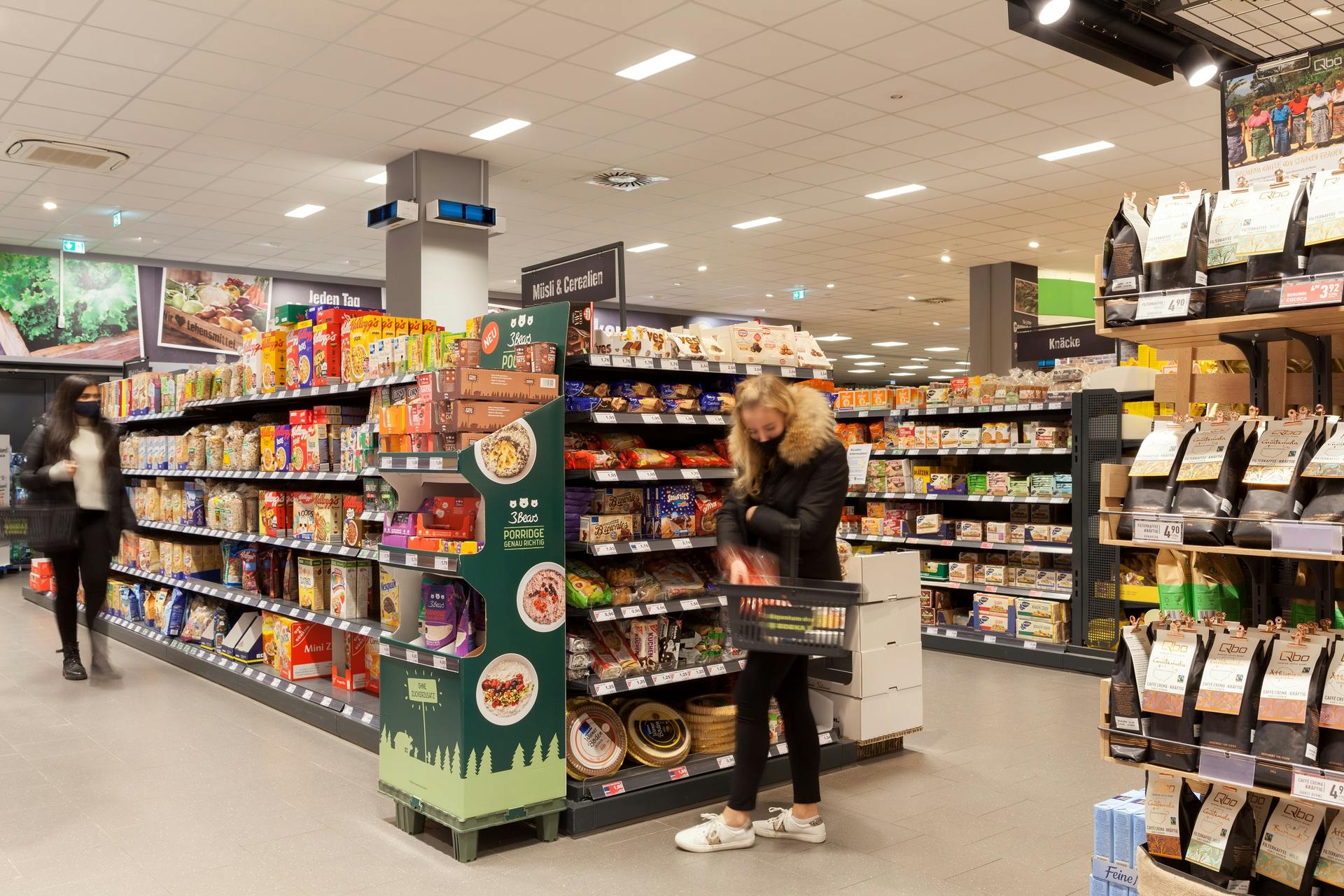Grocery chain Edeka has placed 31 outward-pointing rectangular UV-C fixtures around a Hamburg store at a height of approximately 11 ft, such as the two on the pillar in the upper center of this photo. (Photo credits: All photos courtesy of Signify.)